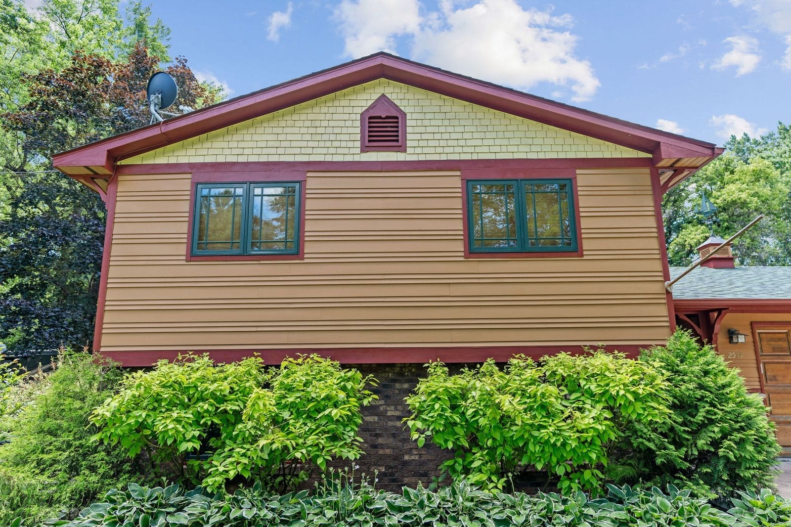 Gable shakes and red trim, Buffalo St painted by Paris Painting in White Bear Lake, MN